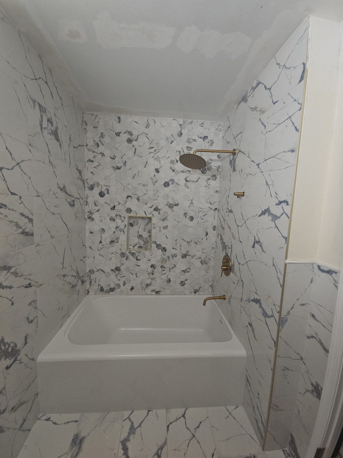 Tiled shower and tub surround